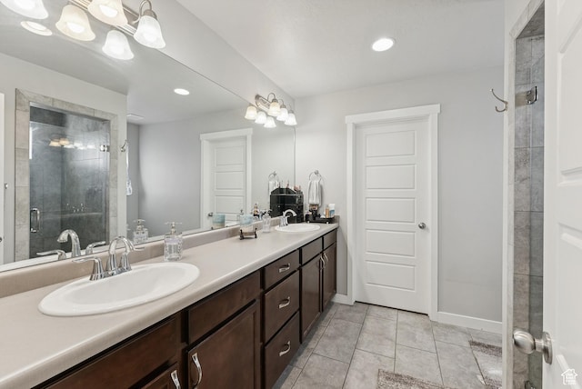 979 N Cold Creek Way, Layton, UT 84041 - bathroom featuring double vanity, tile patterned floors, a shower stall, and recessed lighting