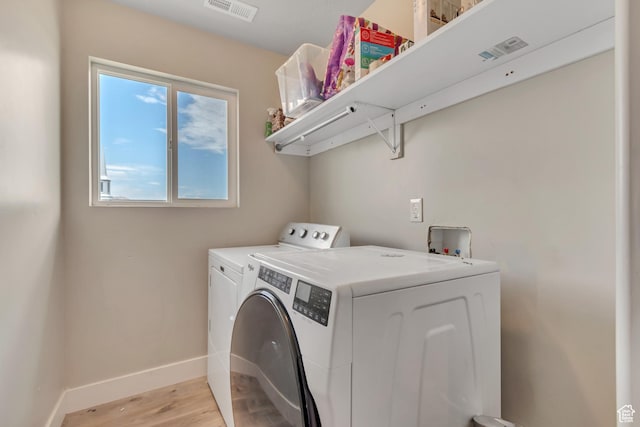 342 W Royal Land Dr, Santaquin, UT 84655 - washroom with light wood-style floors and washing machine and dryer