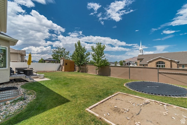 342 W Royal Land Dr, Santaquin, UT 84655 - fenced backyard featuring a storage unit and a trampoline