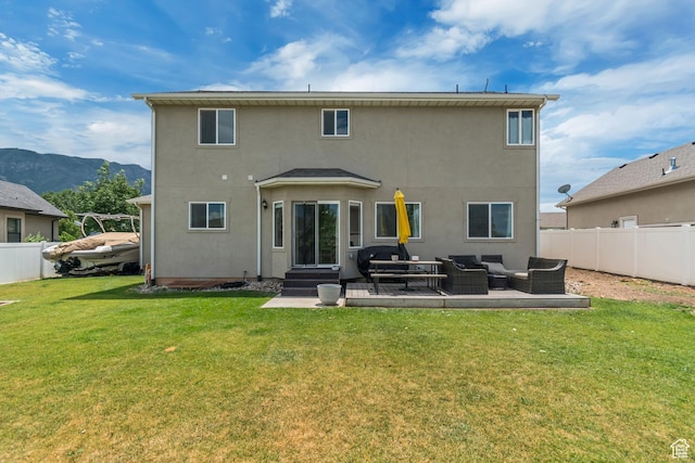 342 W Royal Land Dr, Santaquin, UT 84655 - rear view of house with outdoor lounge area, stucco siding, and a mountain view
