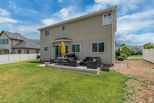 342 W Royal Land Dr, Santaquin, UT 84655 - rear view of house featuring an outdoor hangout area, stucco siding, and a patio