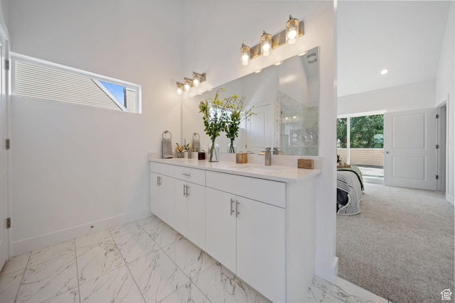 762 E Gables St S Unit 101, Midvale, UT 84047 - full bath featuring double vanity, marble finish flooring, a marble finish shower, and recessed lighting