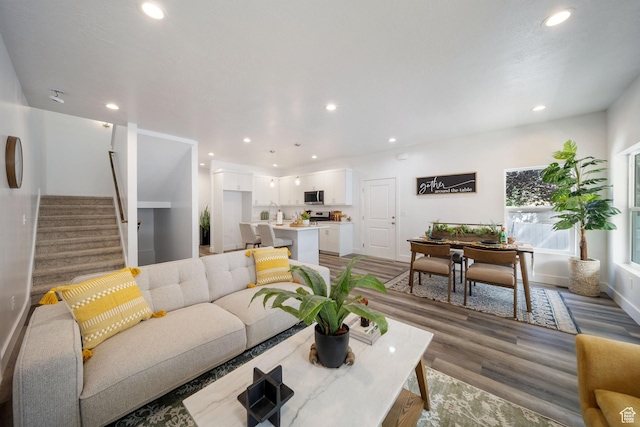 762 E Gables St S Unit 101, Midvale, UT 84047 - living area featuring stairway, recessed lighting, and light wood-type flooring