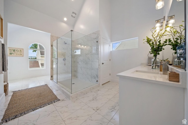 762 E Gables St S Unit 101, Midvale, UT 84047 - full bathroom with marble look tile flooring, a shower stall, and vanity