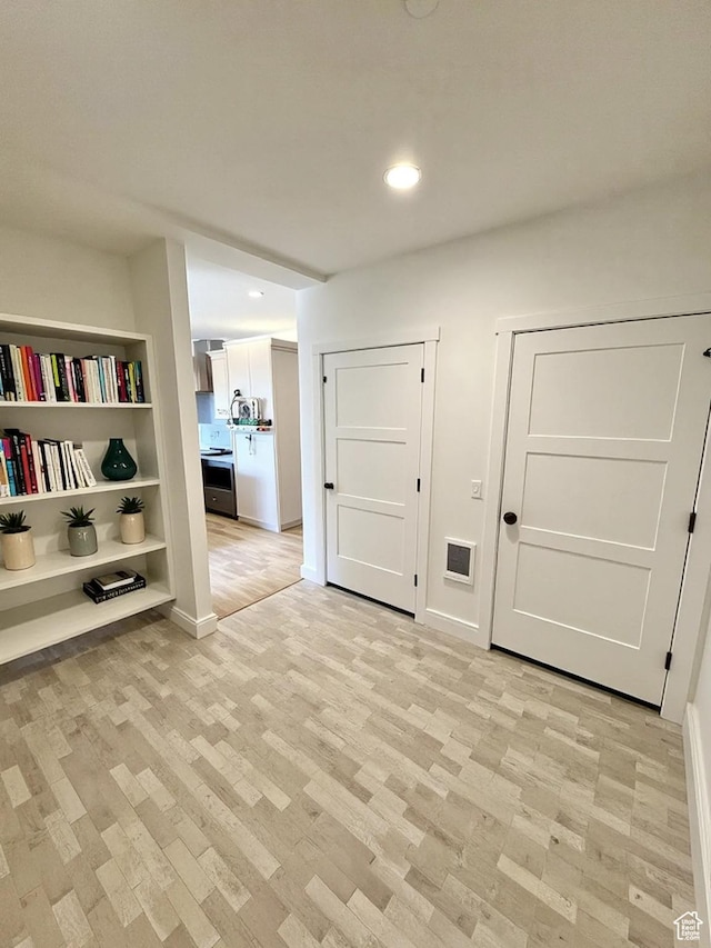 70 E Hwy 153 Unit A4, Beaver, UT 84713 - hall featuring light wood-style floors and recessed lighting