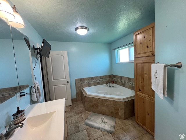 251 N 580 W, Monroe, UT 84754 - bathroom with a bath, a textured ceiling, and vanity