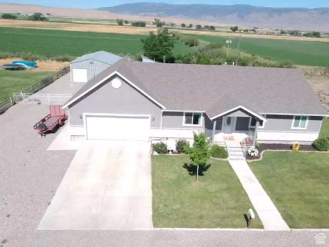 251 N 580 W, Monroe, UT 84754 - single story home with a garage, driveway, a view of rural / pastoral area, a mountain view, and stucco siding