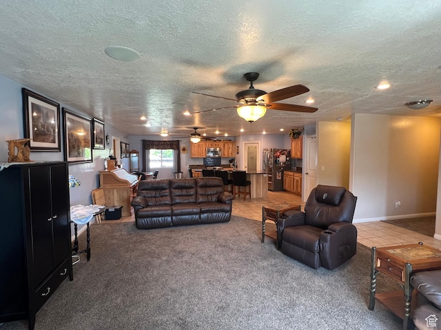 251 N 580 W, Monroe, UT 84754 - living area featuring light carpet, a textured ceiling, ceiling fan, recessed lighting, and light tile patterned flooring