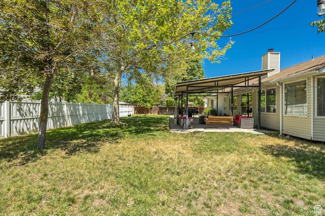 9078 S Harkness Dr W, West Jordan, UT 84088 - fenced backyard with outdoor lounge area and a patio