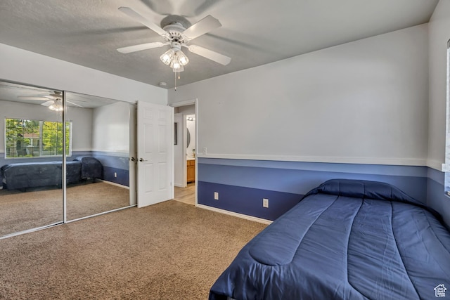 9078 S Harkness Dr W, West Jordan, UT 84088 - bedroom featuring carpet flooring, a closet, and a ceiling fan