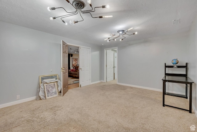 9078 S Harkness Dr W, West Jordan, UT 84088 - unfurnished room with a chandelier, carpet floors, and a textured ceiling