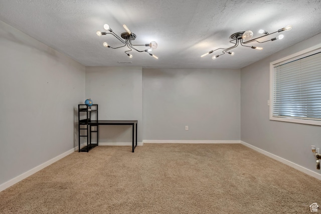 9078 S Harkness Dr W, West Jordan, UT 84088 - below grade area with light carpet, a textured ceiling, and a chandelier