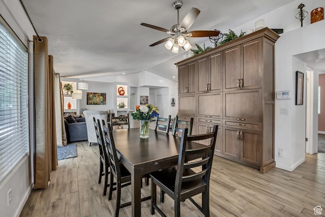 9078 S Harkness Dr W, West Jordan, UT 84088 - dining room with lofted ceiling, a ceiling fan, and light wood finished floors