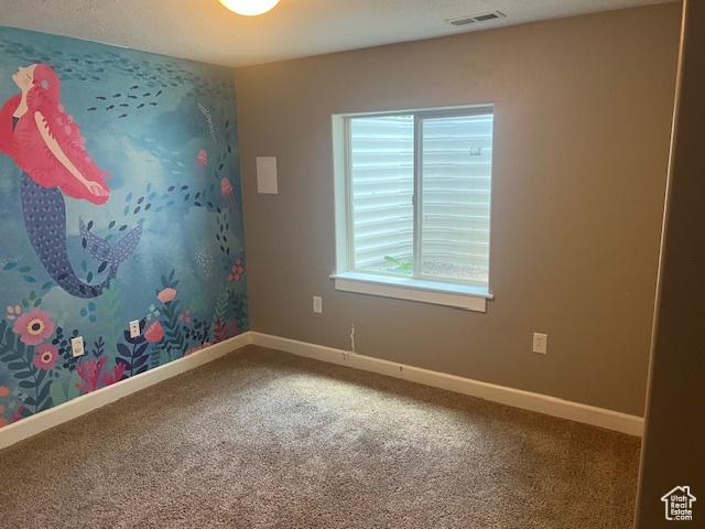 5298 W Icehouse Way, West Jordan, UT 84081 - unfurnished room featuring carpet floors and baseboards