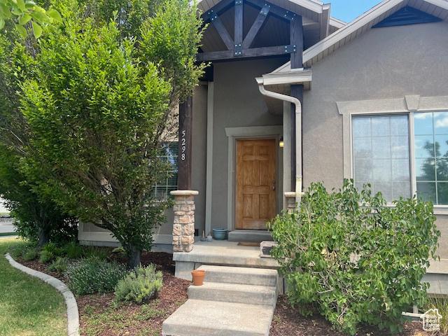 5298 W Icehouse Way, West Jordan, UT 84081 - entrance to property featuring stucco siding