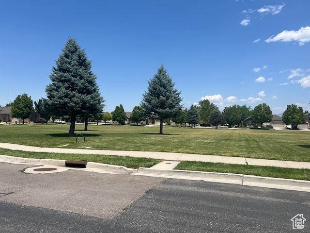 5298 W Icehouse Way, West Jordan, UT 84081 - view of home's community with a lawn