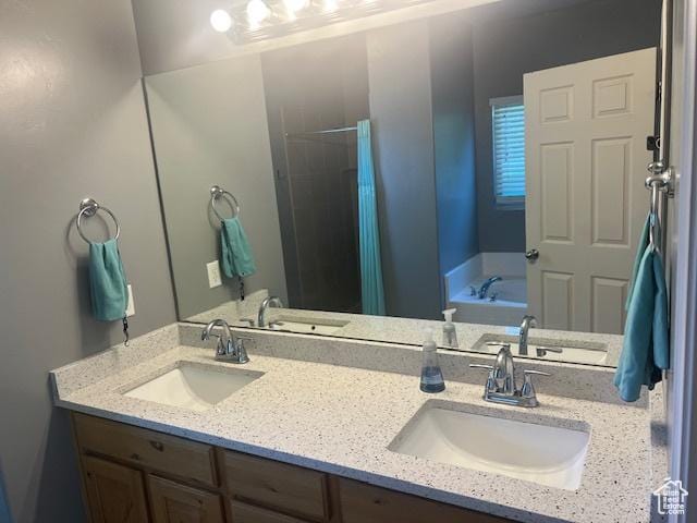 5298 W Icehouse Way, West Jordan, UT 84081 - full bathroom with double vanity, a garden tub, and a shower