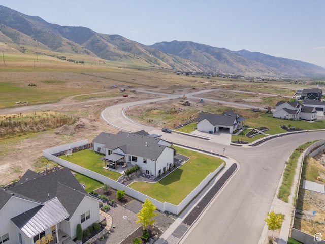 142 N 1100 E, Hyde Park, UT 84318 - aerial view of sparsely populated area with mountains and nearby suburban area