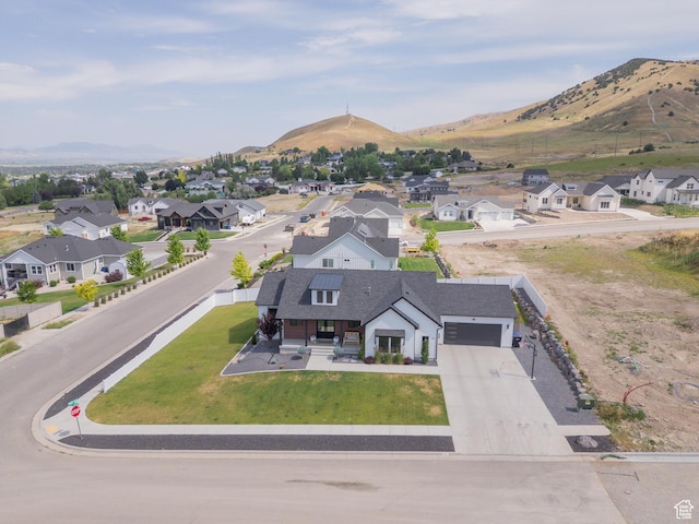 142 N 1100 E, Hyde Park, UT 84318 - aerial view of residential area with a mountain backdrop