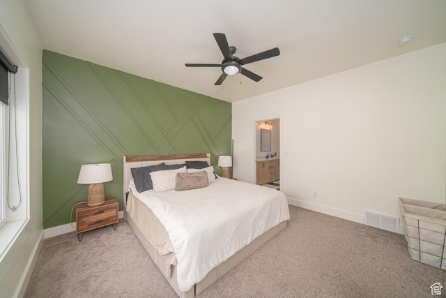 142 N 1100 E, Hyde Park, UT 84318 - bedroom with light carpet, ceiling fan, and ensuite bathroom