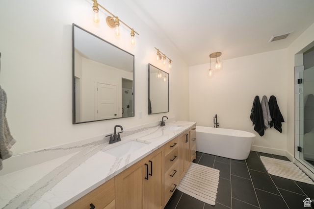 142 N 1100 E, Hyde Park, UT 84318 - bathroom with double vanity, a freestanding bath, a shower with shower door, and tile patterned flooring