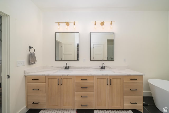 142 N 1100 E, Hyde Park, UT 84318 - full bath featuring double vanity, a freestanding tub, and tile patterned flooring