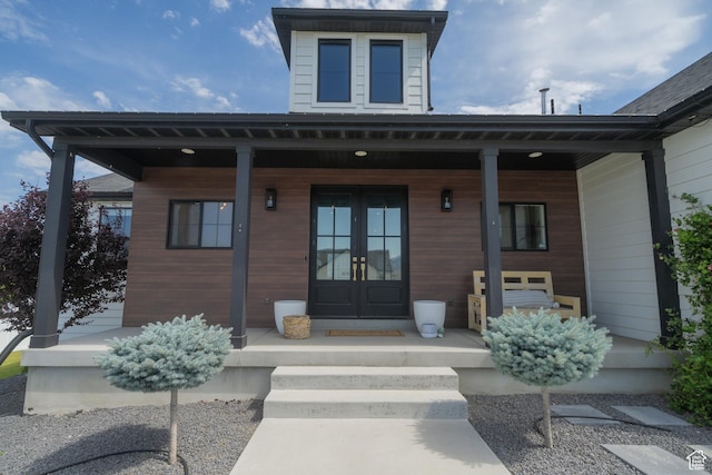 142 N 1100 E, Hyde Park, UT 84318 - property entrance with french doors and covered porch