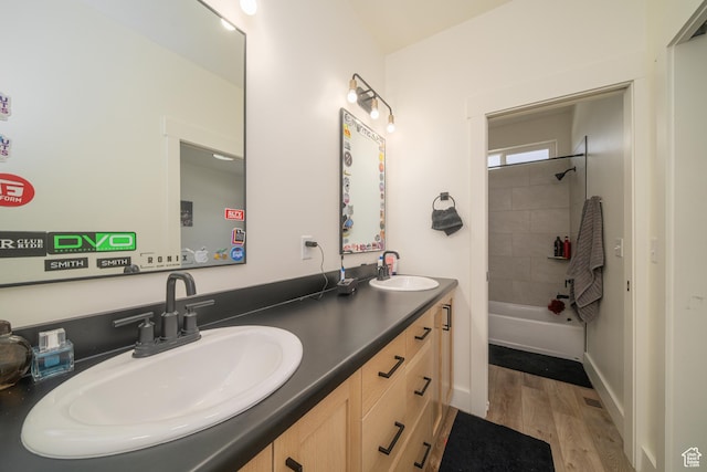 142 N 1100 E, Hyde Park, UT 84318 - full bath with double vanity, wood finished floors, and shower / bathtub combination