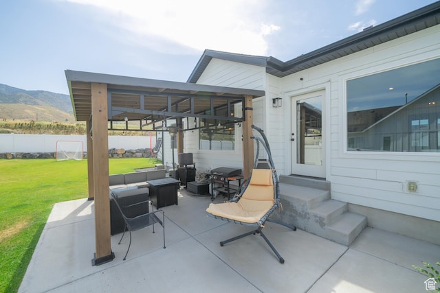 142 N 1100 E, Hyde Park, UT 84318 - view of patio featuring entry steps, an outdoor hangout area, a mountain view, and area for grilling