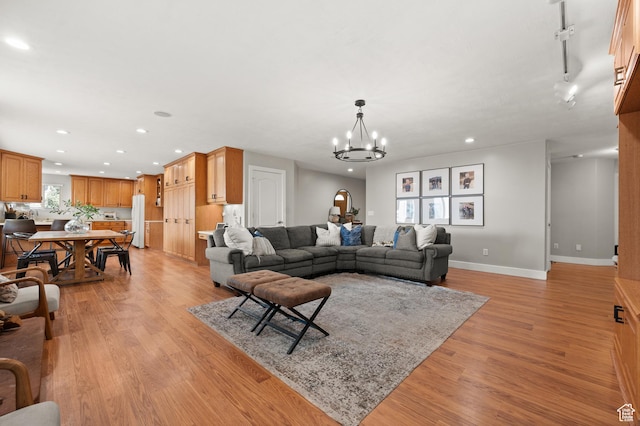 2188 E Country View Ln, Cottonwood Heights, UT 84121 - living room with recessed lighting, light wood finished floors, and a chandelier