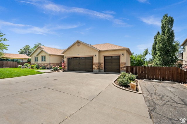 2188 E Country View Ln, Cottonwood Heights, UT 84121 - ranch-style house featuring stone siding, concrete driveway, stucco siding, and a garage