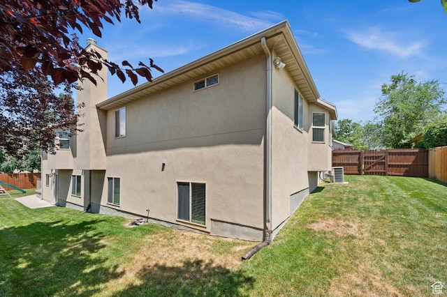 2188 E Country View Ln, Cottonwood Heights, UT 84121 - back of property with a fenced backyard and stucco siding
