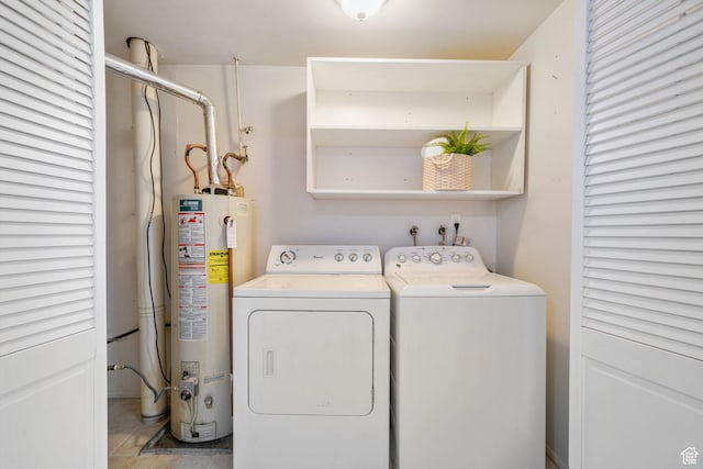 4716 S 700 E Unit 33, Murray, UT 84107 - washroom featuring gas water heater, independent washer and dryer, and tile patterned floors