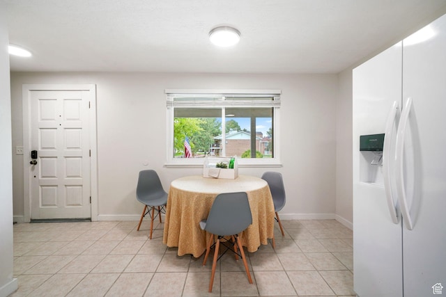 4716 S 700 E Unit 33, Murray, UT 84107 - dining room featuring baseboards and light tile patterned floors