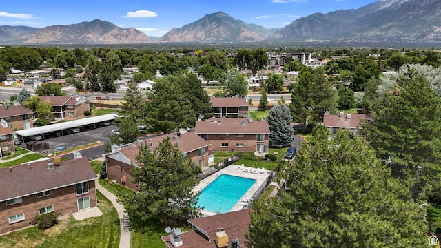 4716 S 700 E Unit 33, Murray, UT 84107 - drone / aerial view of a mountain backdrop and a pool area