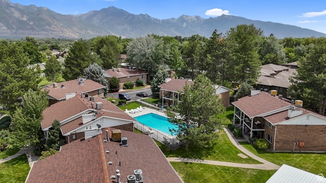 4716 S 700 E Unit 33, Murray, UT 84107 - aerial perspective of suburban area with mountains and a pool area