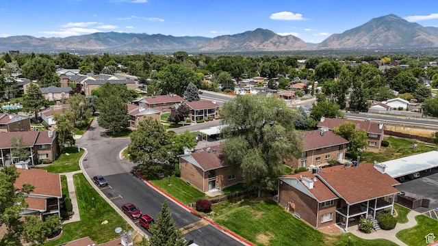 4716 S 700 E Unit 33, Murray, UT 84107 - aerial perspective of suburban area with a mountain backdrop
