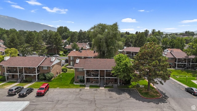 4716 S 700 E Unit 33, Murray, UT 84107 - aerial perspective of suburban area featuring a mountainous background