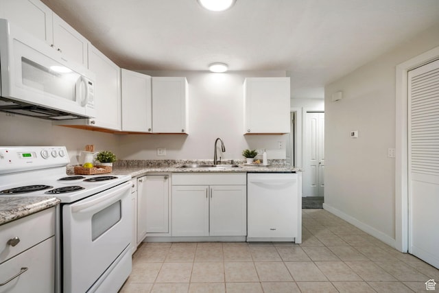4716 S 700 E Unit 33, Murray, UT 84107 - kitchen featuring white appliances, white cabinetry, and light tile patterned flooring