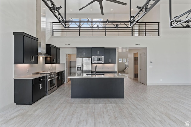 2628 E 40 N Unit 9, Spanish Fork, UT 84660 - kitchen with appliances with stainless steel finishes, dark cabinets, a towering ceiling, light countertops, and ceiling fan