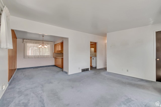 109 W 900 S, Bountiful, UT 84010 - unfurnished living room with a chandelier and light carpet