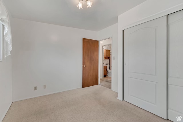 109 W 900 S, Bountiful, UT 84010 - unfurnished bedroom featuring carpet floors, a closet, and a chandelier