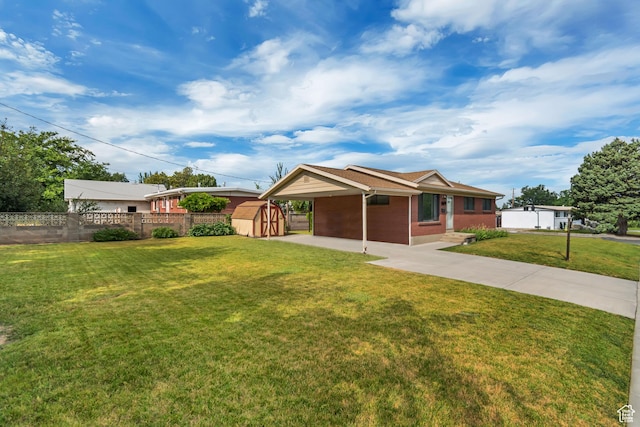 109 W 900 S, Bountiful, UT 84010 - ranch-style home with a storage shed, an attached carport, driveway, and brick siding