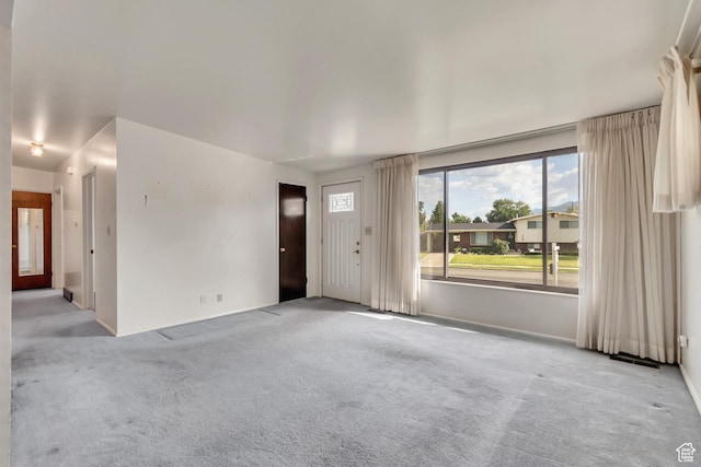 109 W 900 S, Bountiful, UT 84010 - unfurnished living room featuring carpet flooring and baseboards