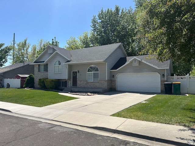 1145 N 560 W, Orem, UT 84057 - split level home with a garage, brick siding, driveway, and a shingled roof