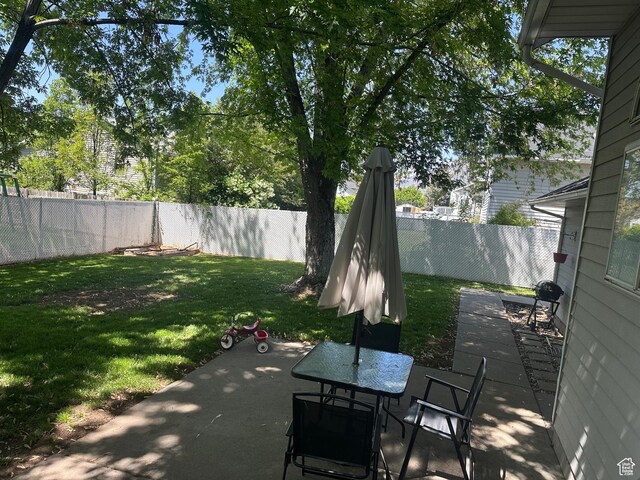 1145 N 560 W, Orem, UT 84057 - fenced backyard featuring a patio and outdoor dining area