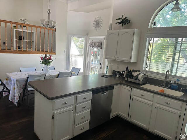 1145 N 560 W, Orem, UT 84057 - kitchen with stainless steel dishwasher, a peninsula, dark countertops, and white cabinets