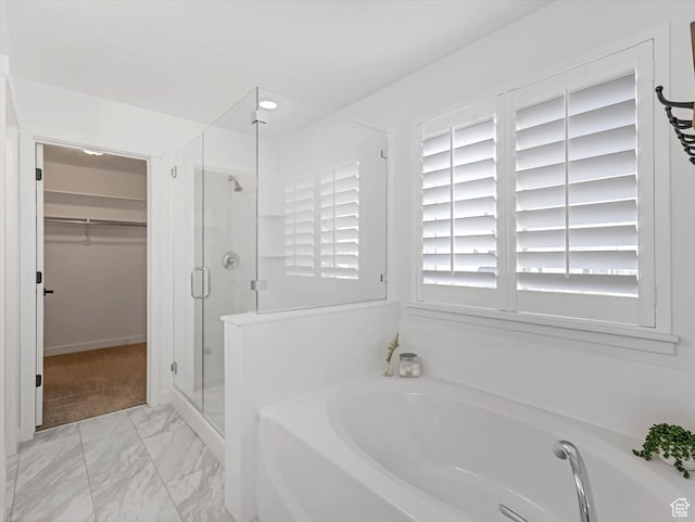 1907 E Brooklyn Cir N, Saratoga Springs, UT 84045 - bathroom with a stall shower, a garden tub, marble look tile flooring, and a walk in closet