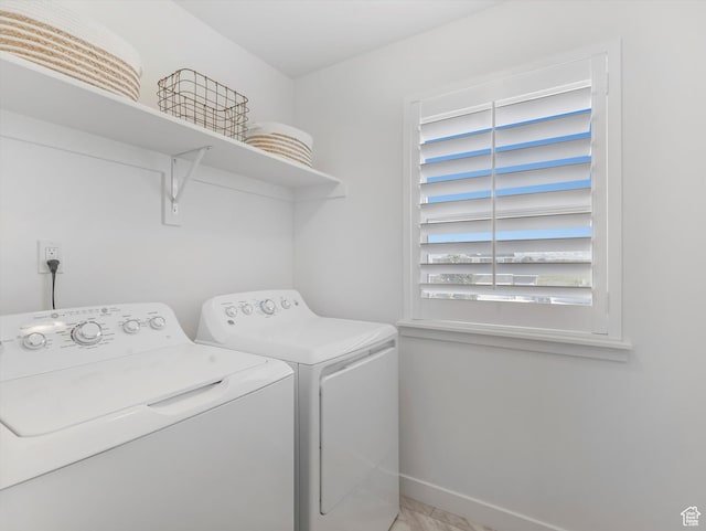 1907 E Brooklyn Cir N, Saratoga Springs, UT 84045 - laundry area with washing machine and dryer and baseboards