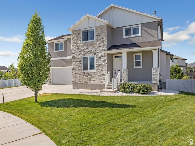 1907 E Brooklyn Cir N, Saratoga Springs, UT 84045 - view of front of property with stone siding, stucco siding, an attached garage, and driveway